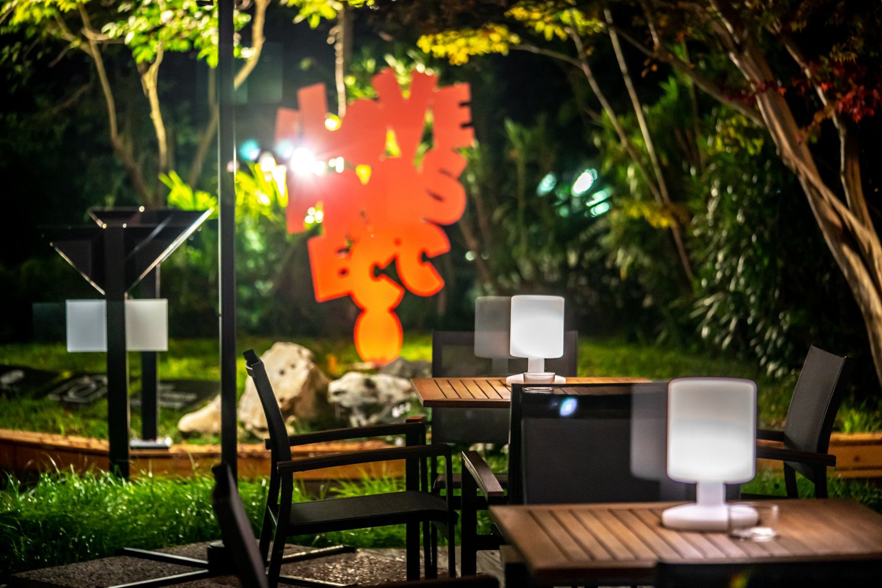 The Hotel Diana garden at night